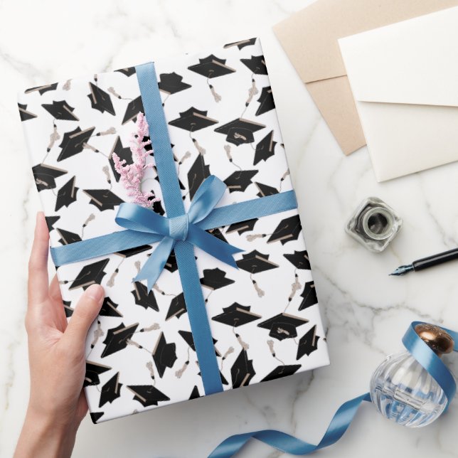 Black Graduation Caps Tossed in the Air on White Wrapping Paper (Gifting)