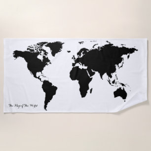 black graphic map of world on white beach towel