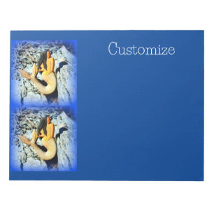 black-hair mermaid on blue notepad