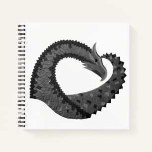 Black heart dragon on white notebook