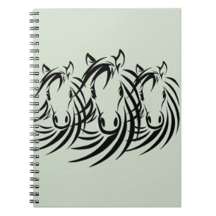 Black Horse Heads on Green Notebook