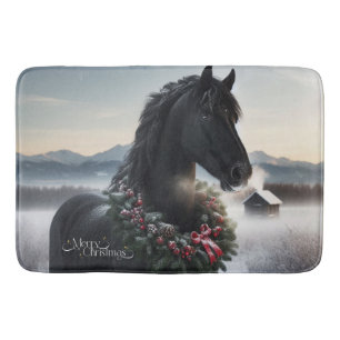 Black horse in the snow with Christmas wreath Bath Mat