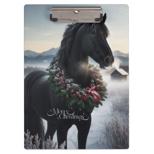 Black horse in the snow with Christmas wreath  Clipboard