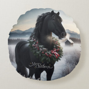 Black horse in the snow with Christmas wreath Round Cushion