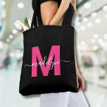 Black Hot Pink Modern Script Name Monogram Tote Bag<br><div class="desc">Personalised Elegant Black and Magenta Hot Pink Trendy Modern Script Name Monogram Tote Bag. Add a touch of fun and glamour to your everyday style with this chic tote bag. Featuring a bold magenta hot pink initial centred on a crisp black background, and a clean, modern design on both sides,...</div>