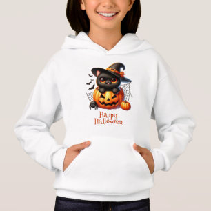 Black Kitten in a Halloween Pumpkin
