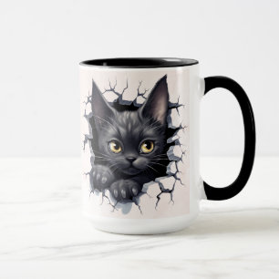 Black kitten in a wall mug
