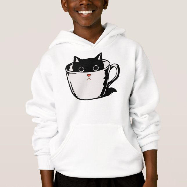Black kitten with red nose hiding in a cup (Front)