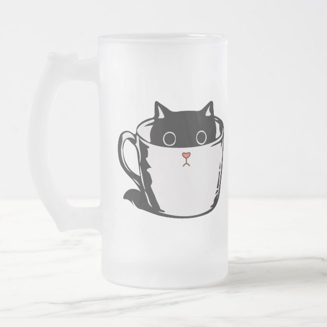 Black kitten with red nose hiding in a cup (Left)