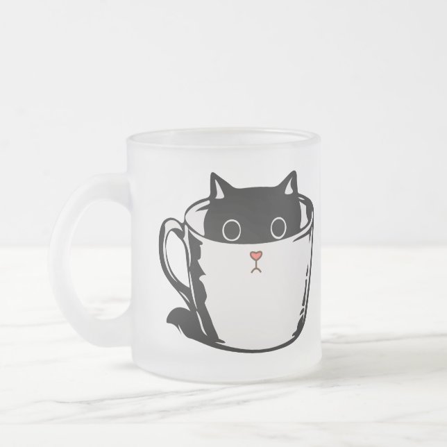 Black kitten with red nose hiding in a cup (Left)