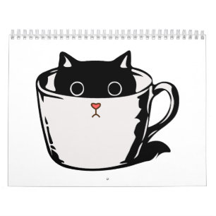 Black kitten with red nose hiding in a cup calendar