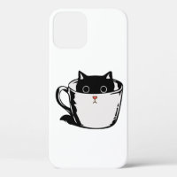 Black kitten with red nose hiding in a cup