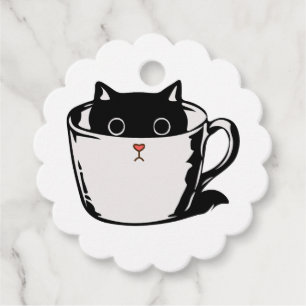 Black kitten with red nose hiding in a cup favour tags