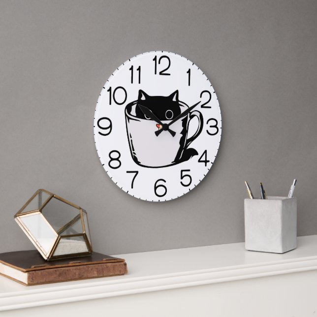 Black kitten with red nose hiding in a cup large clock (Office)