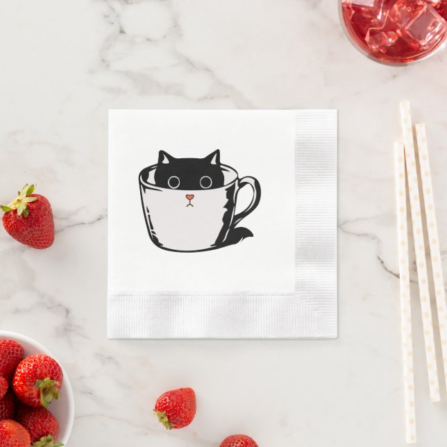 Black kitten with red nose hiding in a cup napkin (Insitu)