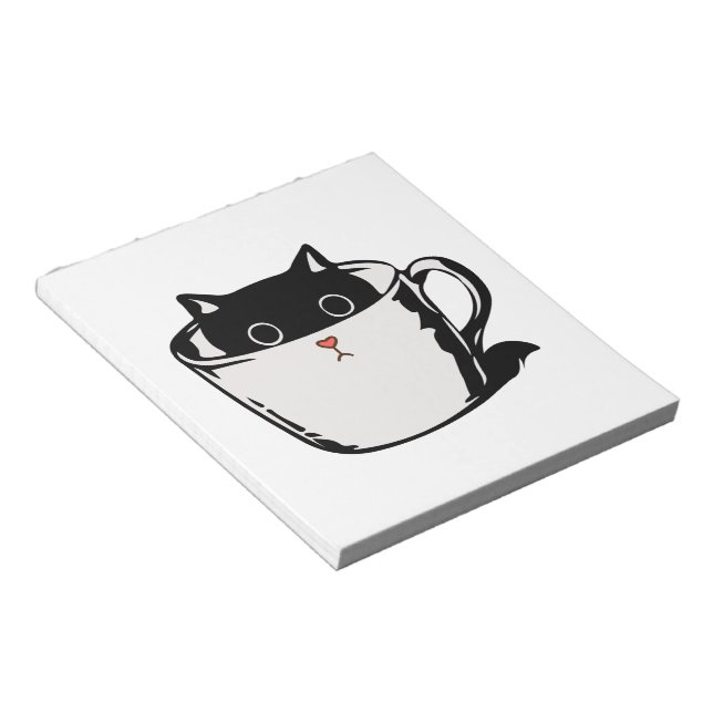 Black kitten with red nose hiding in a cup notepad (Angled)