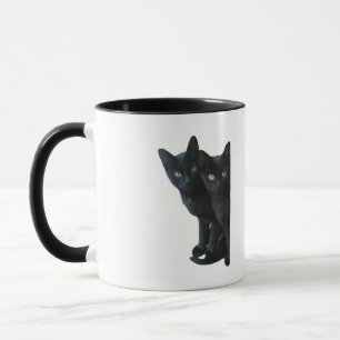 Black kittens mug