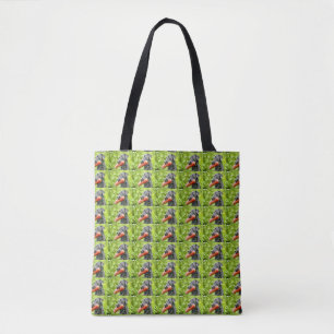 black lab retrieving tote bag