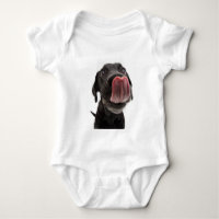 Black Labrador Licking Its Nose