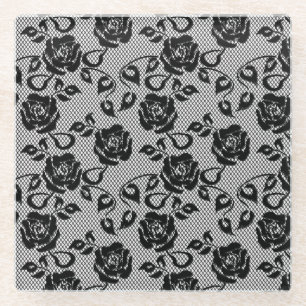 Black lace pattern on white background glass coaster
