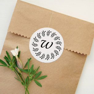 Black laurel wreath monogrammed classic round sticker