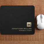 Black Leather Gold Monogram Mouse Mat<br><div class="desc">Add a touch of sophistication to your workspace with this personalised black leather and gold monogram mouse pad. The classic block typography and brushed monogram medallion with your initials make it a perfect accessory for your home or office. The smooth surface and non-slip backing provide optimal mouse performance, making this...</div>