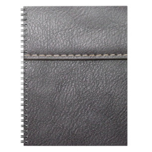 Black leather stitched with white stitching notebook
