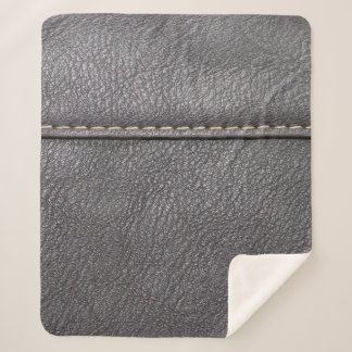 Black leather stitched with white stitching sherpa blanket
