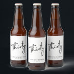 Black Lettering Thirty | 30th Birthday Party Beer Bottle Label<br><div class="desc">This modern bottle label is perfect for a chic modern 30th birthday party. The design features black lettering " Thirty " with custom text. You can personalise the text and background colour. Matching invitation and party supplies are available at my shop BaraBomDesign. Thank you!</div>