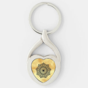 Black mandala on soft gold background key ring