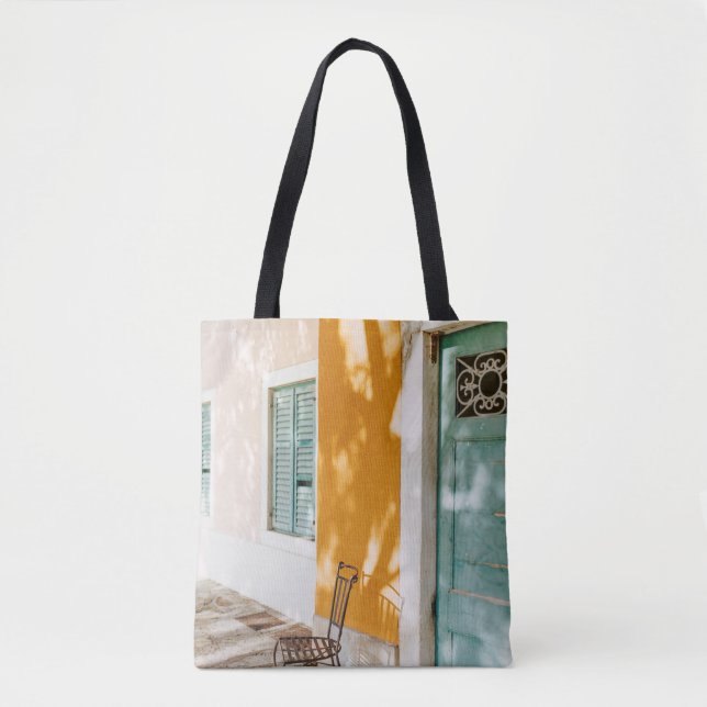 Black metal chair near dor tote bag (Front)