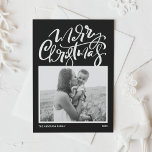 Black Modern Calligraphy Photo Merry Christmas Holiday Card<br><div class="desc">Merry Christmas! Send Christmas wishes to family and friends with this customisable photo Christmas card. It features modern calligraphy and a simple script on a black background. Personalise this modern calligraphy Christmas card by adding your photo,  message and names. This modern Christmas card is available on other cardstock.</div>