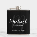 Black Modern Script Personalised Groomsmen Hip Flask<br><div class="desc">Add a personal touch to your wedding with personalised groomsmen flask. This flask features personalised groomsmen's name in white modern script font style and monogram in light grey modern script font style as background with title and wedding date in white modern sans serif font style on black background. Also perfect...</div>