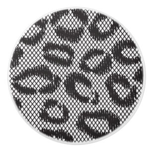 Black net lace with leopard pattern on white ceramic knob