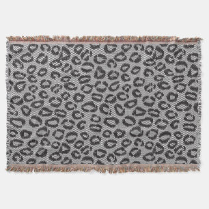 Black net lace with leopard pattern on white throw blanket