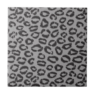 Black net lace with leopard pattern on white tile
