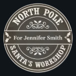 Black North Pole Christmas delivery gift sticker<br><div class="desc">A Christmas chalkboard postal style sticker for gifts. The design says 'North Pole' and 'Santa's workshop' around the border in black and cream and there is space in the middle for your name. The sticker is designed to look like a postmark or a seal from the North Pole. This would...</div>