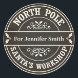 Black North Pole Christmas delivery gift sticker<br><div class="desc">A Christmas chalkboard postal style sticker for gifts. The design says 'North Pole' and 'Santa's workshop' around the border in black and cream and there is space in the middle for your name. The sticker is designed to look like a postmark or a seal from the North Pole. This would...</div>