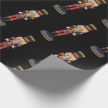 Black Nutcracker Red Soldier Christmas  Wrapping Paper<br><div class="desc">Make your presents stand out under the tree with our premium Black Nutcracker Red Soldier Christmas Wrapping Paper. The striking design,  showcasing handsome nutcracker soldiers in colourful uniform against a dramatic black backdrop,  adds a festive and stylish touch to your holiday gifts.</div>