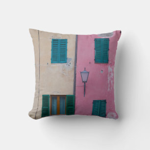 BLACK OUTDOOR SCONCE ON PINK PAINTED WALL CUSHION