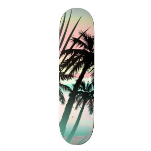 Black palms at sunset skateboard