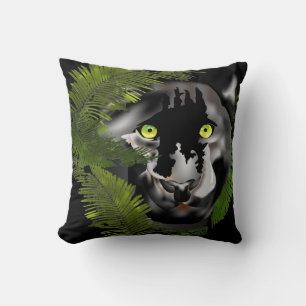 Black panther looking through foliage cushion