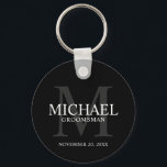 Black Personalised Groomsmen's name and monogram Key Ring<br><div class="desc">Add a personal touch to your wedding with personalised groomsmen keychain. This keychain features personalised groomsman's name with title and wedding date in white and monogram in grey as background, in classic serif font style, on black background. Also perfect for best man, father of the bride, ring bearer and more....</div>