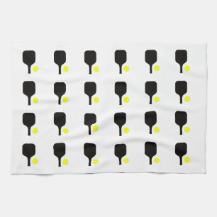 Black pickleball paddles & yellow balls  tea towel