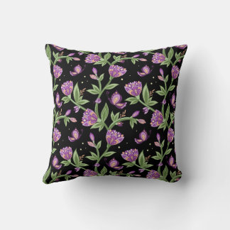 Black pillow with purple flowers 