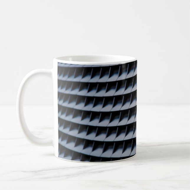 Black plastic frame coffee mug (Left)