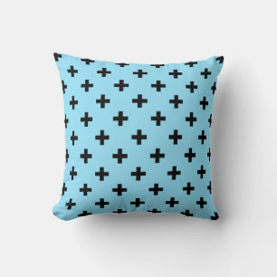 Black polka crosses on baby blue cushion