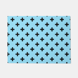 Black polka crosses on baby blue doormat