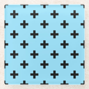 Black polka crosses on baby blue glass coaster