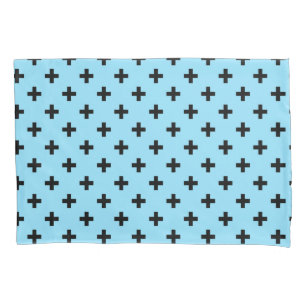 Black polka crosses on baby blue pillowcase